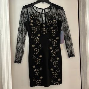 Black bodycon dress with lace sleeves & gold embroidery never worn new with tags